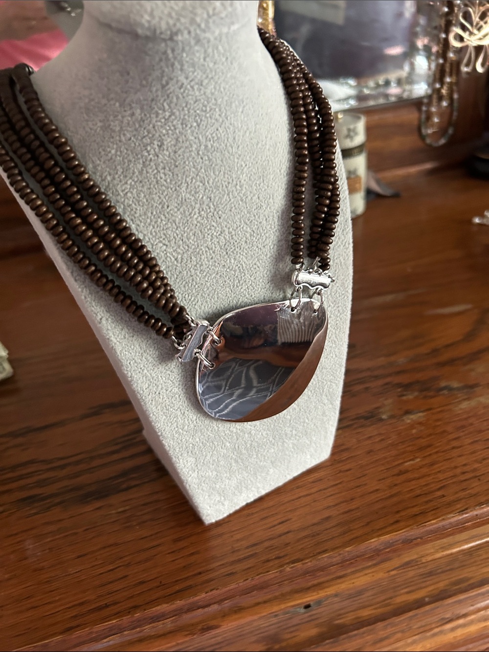 Handcrafted Brown Beaded Necklace with Silver Pendant